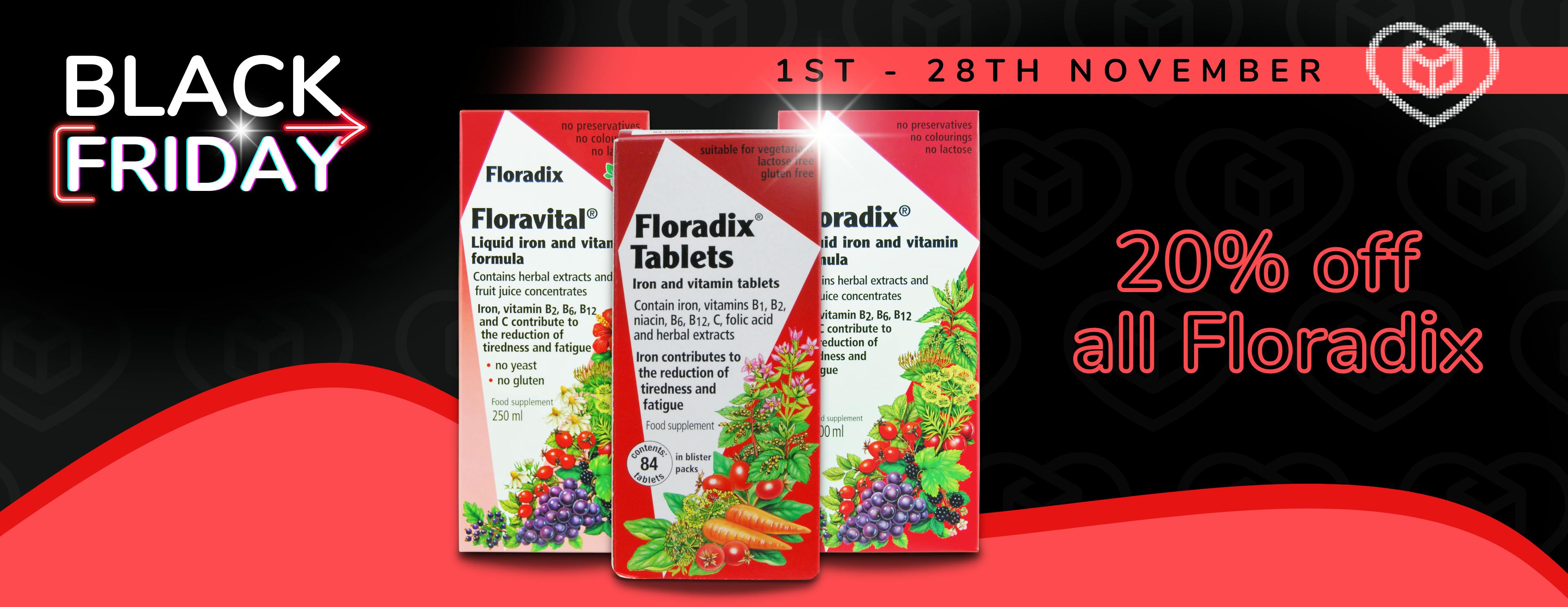 Floradix liquid supplements, tablets and iron formula on a black background