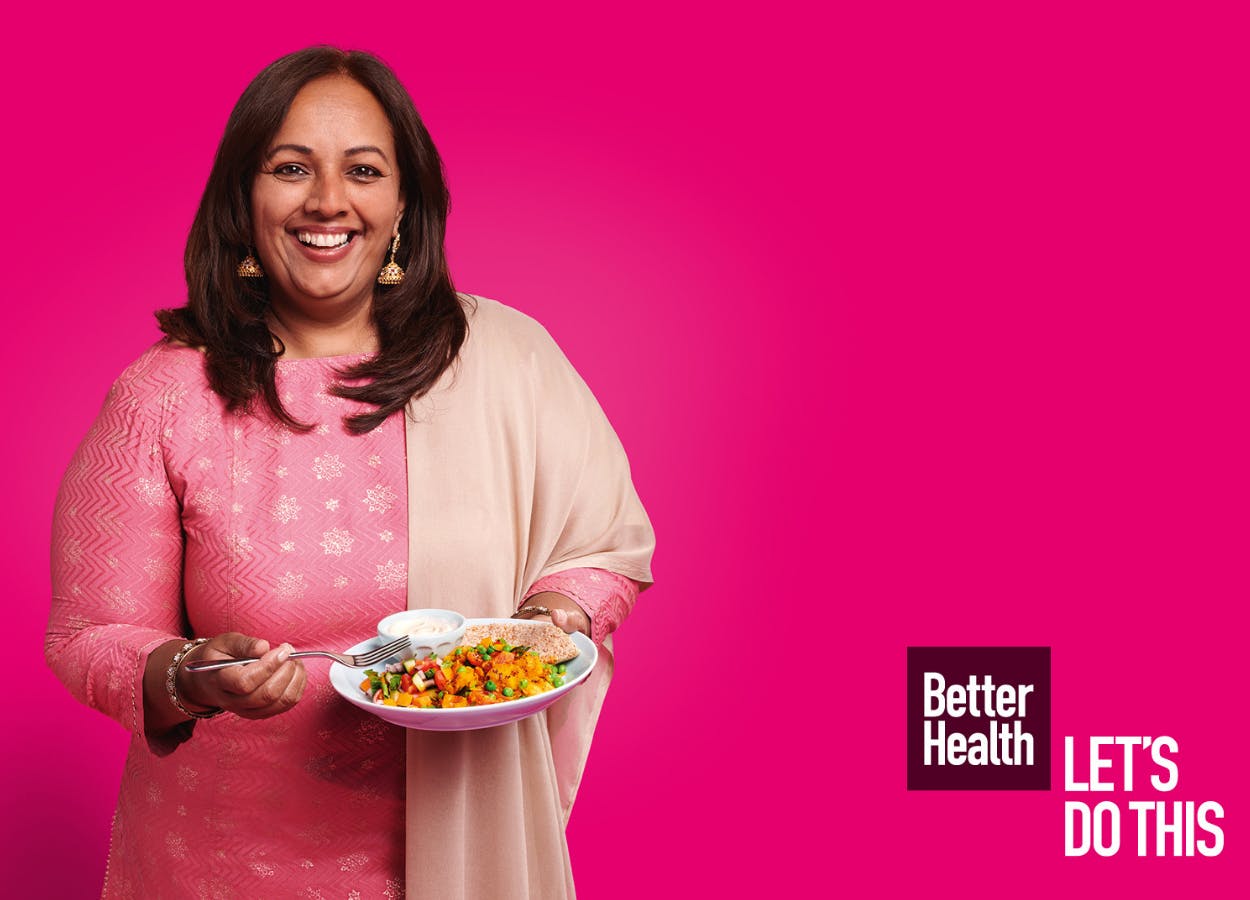 Woman eating healthy as part of NHS Better Health campaign