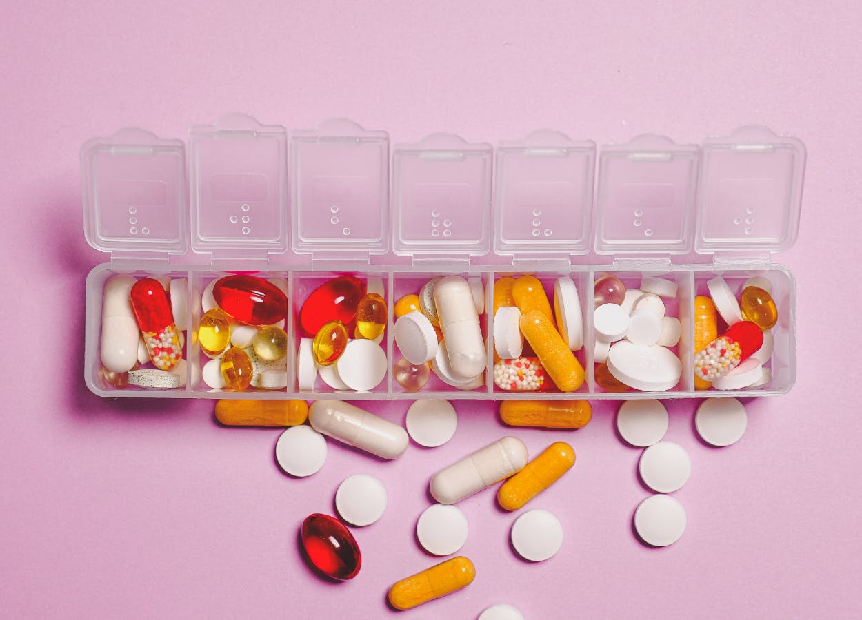 Image of vitamins and supplements in a pill box